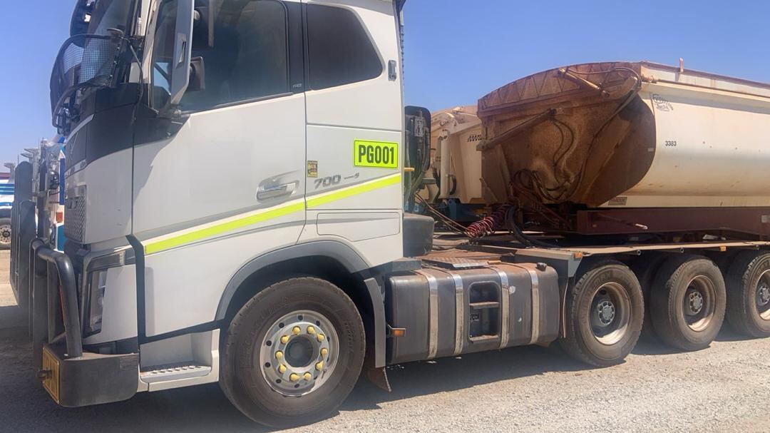 Volvo FH prime mover PG001 coupled to a side tipper